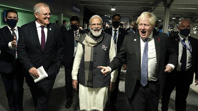 Scott Morrison, left, with Indian Prime Minister Narendra Modi and his British counterpart, Boris Johnson, on Tuesday. Picture: Adam Taylor