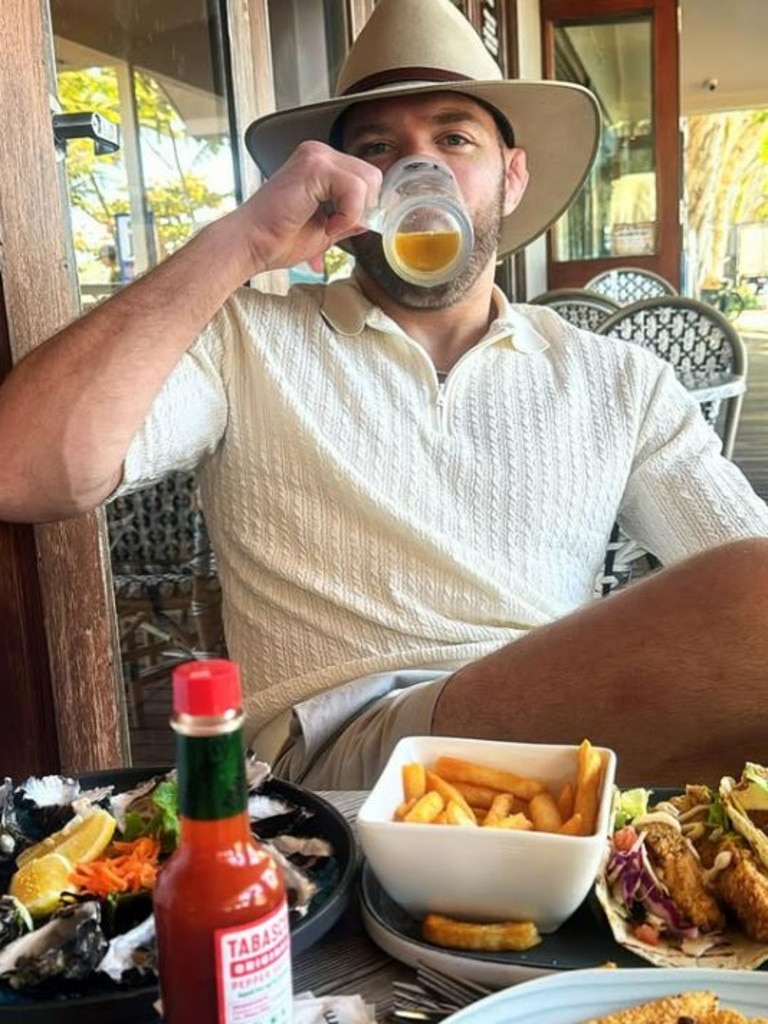 Celebrating his win over Israel Adesanya last year with a cold beer while wearing his Aussie akubra. Picture: Supplied/Instagram