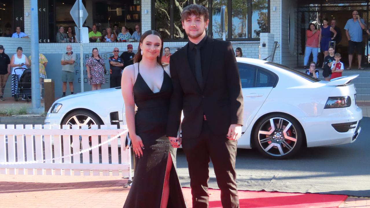 The students from Urangan State High School celebrating their formal.