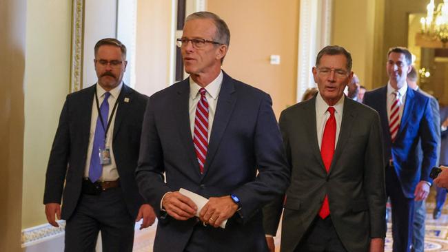 South Dakota senator John Thune, centre, after being elected Senate majority leader in a secret ballot. Picture: AFP