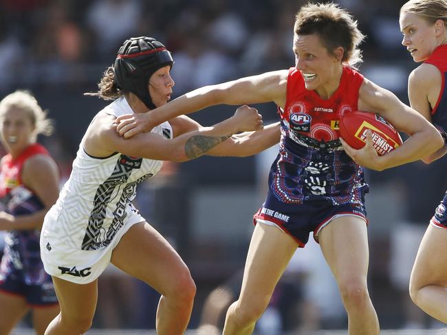 Paxman takes on Collingwood’s Brittany Bonnici during their clash last weekend. Picture: AFL Photos/Getty Images