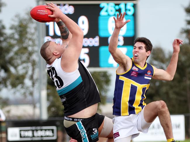 EDFL: Hillside’s Joshua Covelli takes a mark. Picture: George Salpigtidis