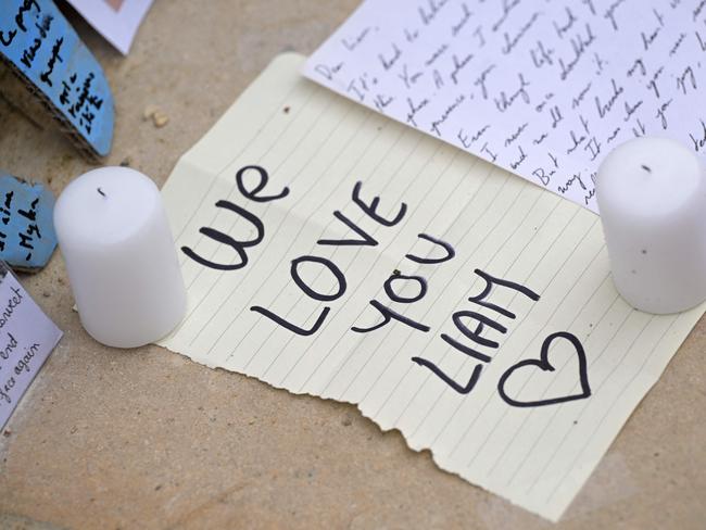 A note displayed as fans gather to pay tribute to Liam Payne, former member of the British pop band One Direction, at Jardin des Tuileries in Paris. Picture: AFP