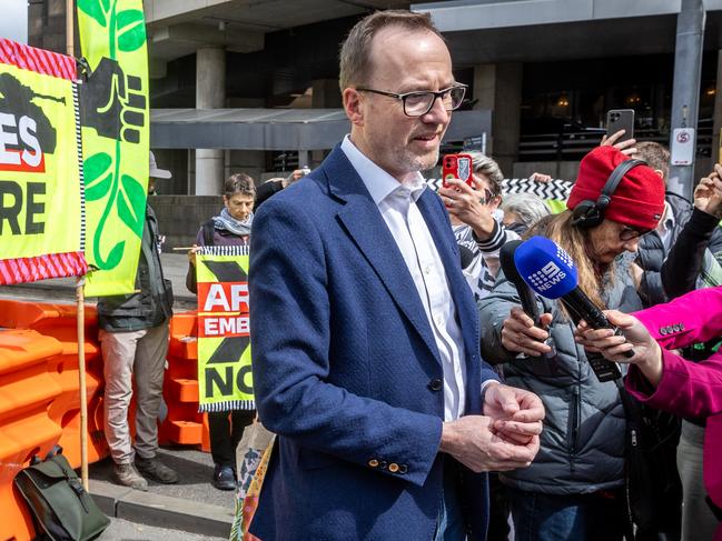 Greens Senator David Shoebridge visits protesters at the anti-war rally outside the weapons expo. Picture: Jake Nowakowski