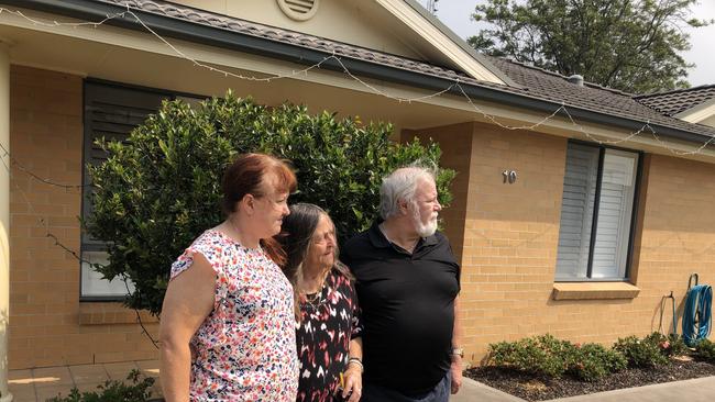 Neighbours Roslyn Dent (left), Barbara Osborn (middle) and Rod Dawson (right) to couple Richard Elzer and Karla Matthews. Picture: Amy Ziniak