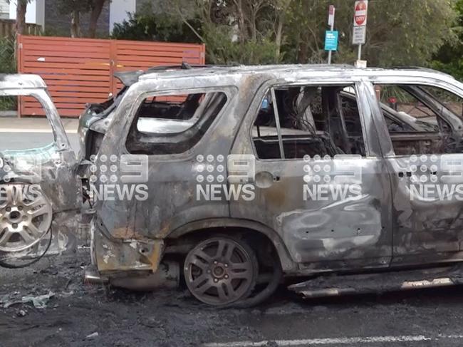 The remnants of a suspicious vehicle fire at Palm Beach. Picture: 9 News Gold Coast