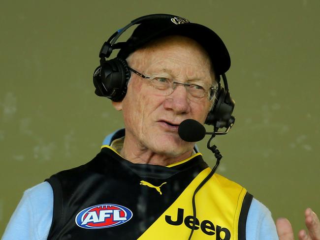 29/09/2017: Richmond great Kevin Bartlett talks on the radio at the Richmond Football Club final training ahead of the AFL Grand Final.  Picture: Stuart McEvoy for the Australian.