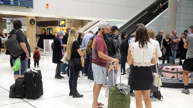 Passengers getting off one of the last flights from interstate before the lockout.