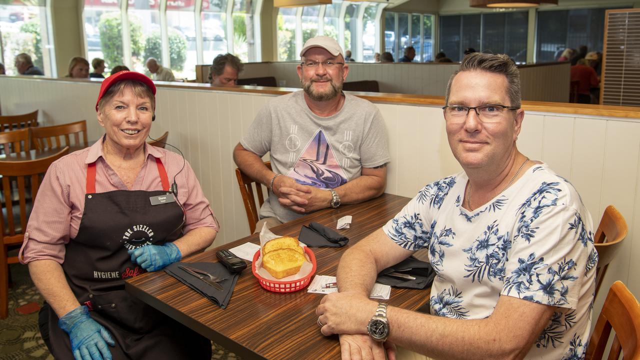 (From left) Sizzler staff member Sharron Groom has a chat with long term customers (10 years) Robert Taylor and Adam Kelly. Last days at Sizzler Toowoomba. Friday. 13th Nov 2020