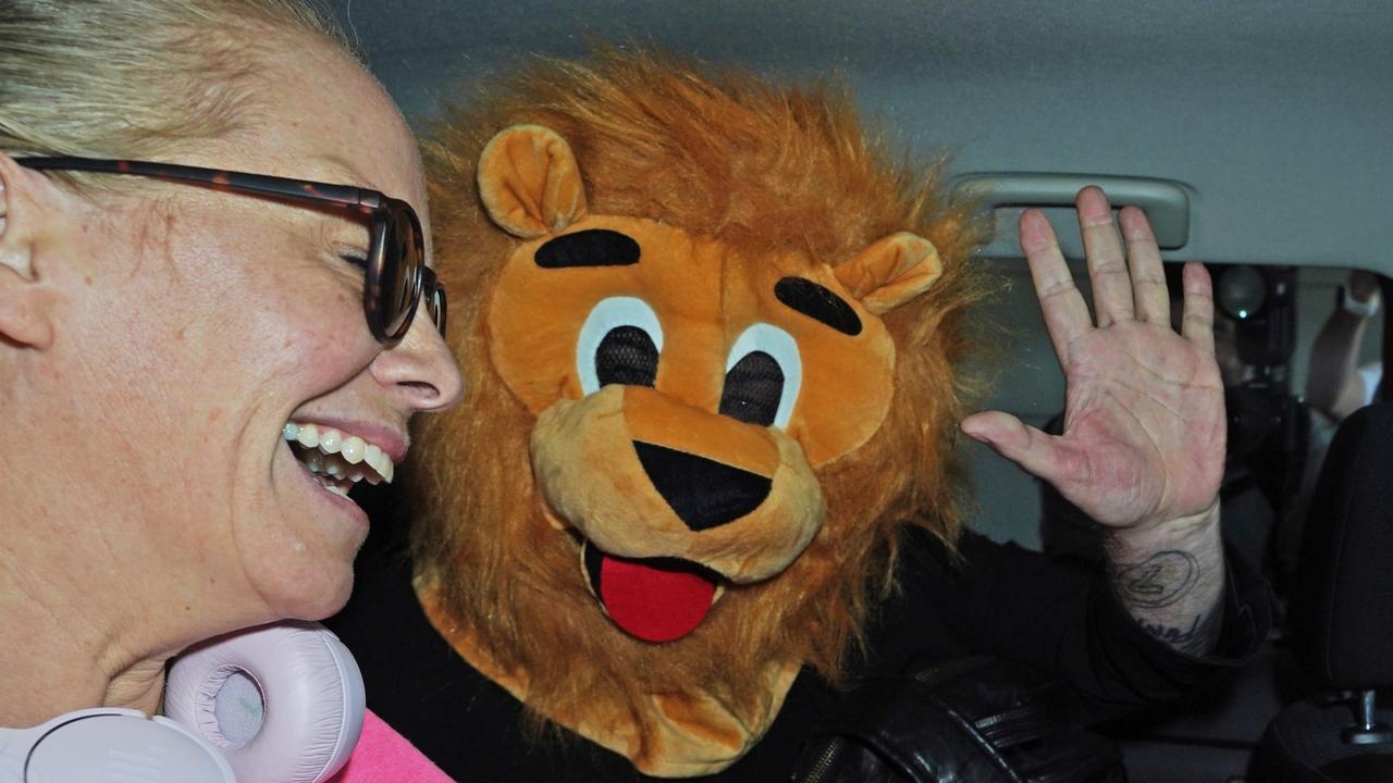 Boy George arrives in Brisbane, Australia with a lion mask for the filming of I’m a Celeb. Picture: Brian Roberts