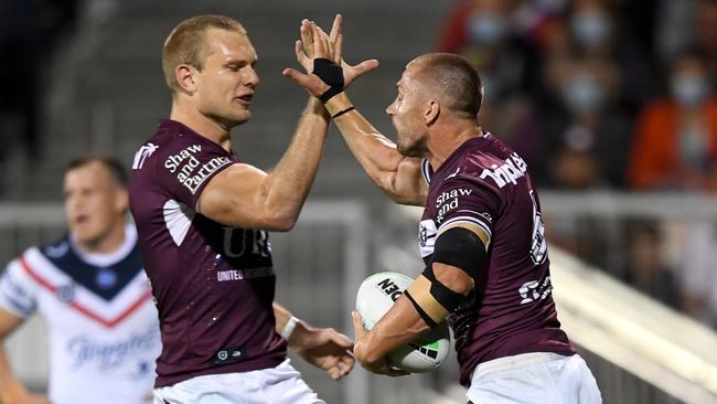 Tom Trbojevic and Kieran Foran celebrate a Manly try. Picture: NRL Photos