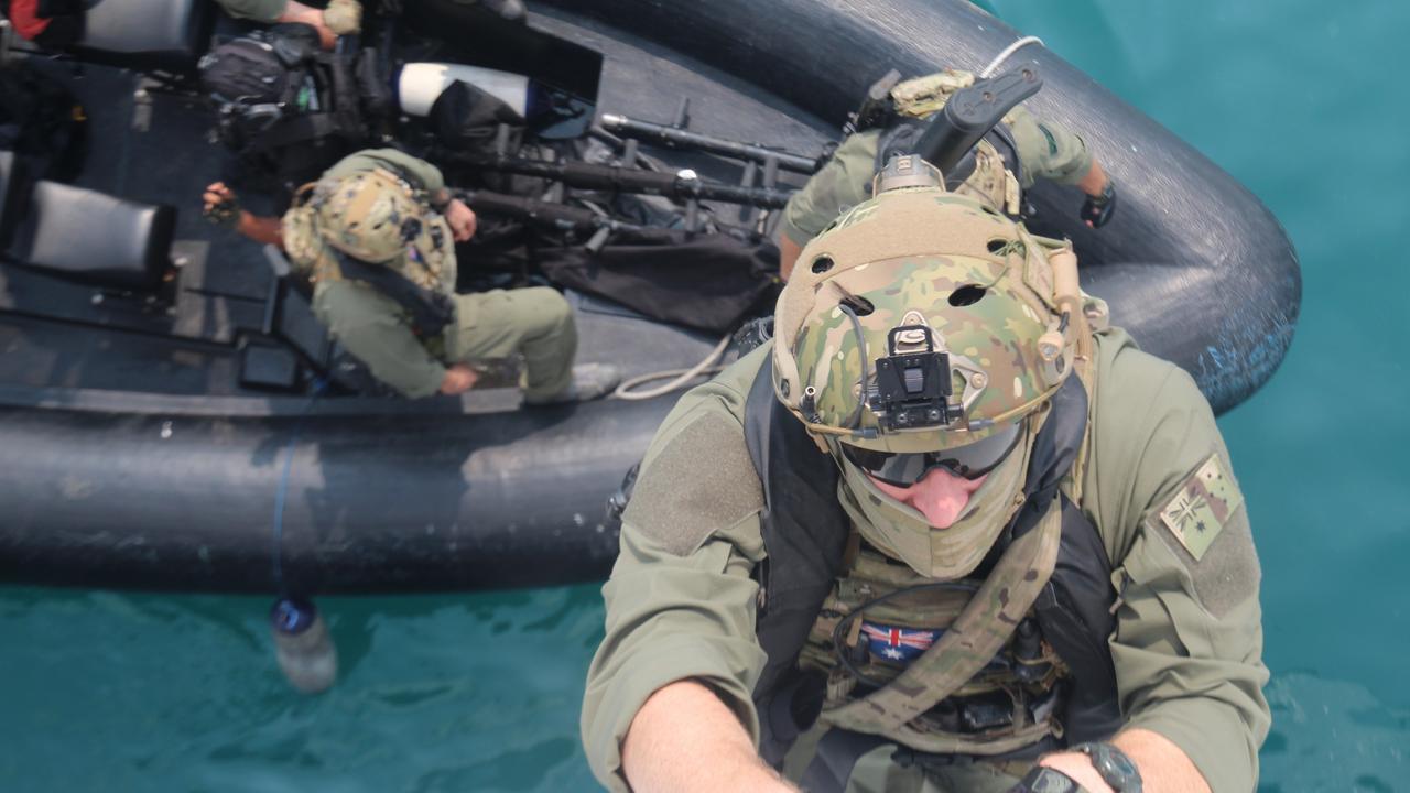 A soldier from the SAS boards a ferry in Sunda Strait during a full-mission profile training activity. Picture: Special Operations Command