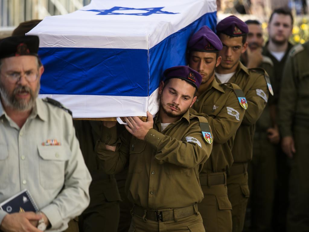 Friends from the army unit carry the coffin of soldier, Adi Leon, killed during an ground operation in the Gaza Strip. Picture: Getty Images