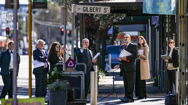 Prosecutor Michael Foundas (centre) points out an area of interest during a scene view on Goodwood Rd, Goodwood, on Wednesday, surrounded by defence lawyer Paul Rice KC (second from left), and Judge Nick Alexandrides, (third from right), other lawyers and court staff. Lauren Jean Willgoose is accused of killing Anthony Walsh, 70, about 10pm on June 30, 2021. Ms Willgoose has pleaded not guilty to aggravated causing death by dangerous driving and leaving the scene of an accident. Picture: NCA NewsWire / Brenton Edwards