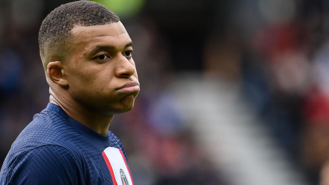 (FILES) Paris Saint-Germain's French forward Kylian Mbappe reacts during the French L1 football match between Paris Saint-Germain (PSG) and FC Lorient at The Parc des Princes Stadium in Paris on April 30, 2023. Paris Saint-Germain president Nasser al-Khelaifi on July 5, 2023 insisted superstar forward Kylian Mbappe "must sign a new contract" if he wants to remain at the club next season. (Photo by FRANCK FIFE / AFP)
