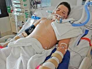 Christian Hermann in hospital last year with the rare nerve disease Guillain-Barre syndrome. Picture: Kathryn Cordwell