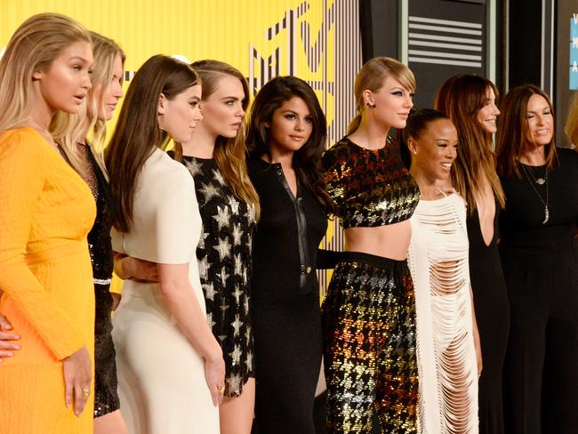 Gigi Hadid (left) and Selena Gomez (fifth from left) are part of Taylor Swift’s “squad”. Picture: Frazer Harrison/Getty Images
