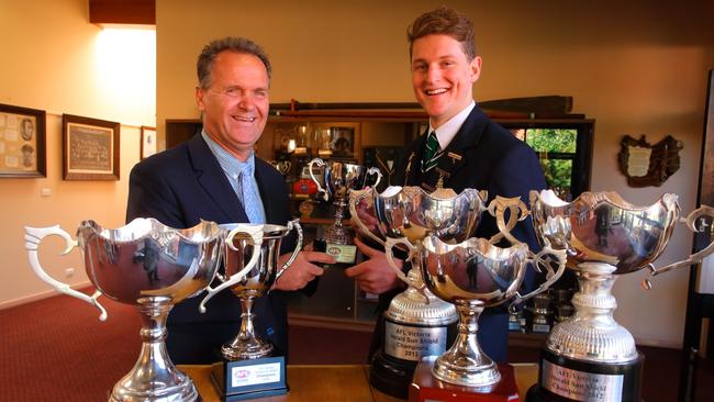 St Patrick’s College 1st XVIII coach Howard Clark and current Richmond player Jacob Hopper in 2015. Picture: Supplied