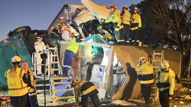 A man has died and another has been flown to hospital in a critical condition after being trapped inside a B-double in a horror crash in the state's south. Picture: FRNSW