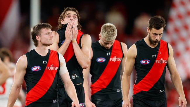 MELBOURNE, AUSTRALIA - AUG 16: Harrison Jones of the Bombers looks dejected after a loss during the 2024 AFL Round 23 match between Essendon Bombers and the Sydney Swans at Marvel Stadium on August 16, 2024 in Melbourne, Australia. (Photo by Dylan Burns/AFL Photos via Getty Images)