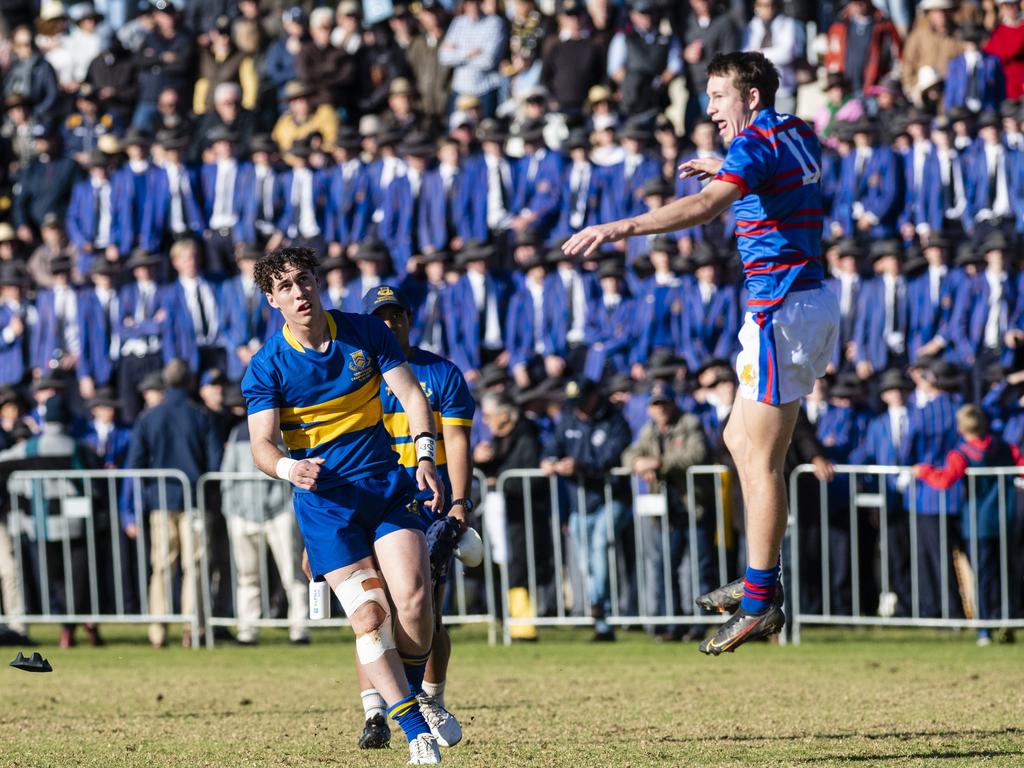 Chace Oates (left) of Grammar and Wes O'Brien of Downlands in O'Callaghan Cup on Grammar Downlands Day at Downlands College, Saturday, August 6, 2022. Picture: Kevin Farmer