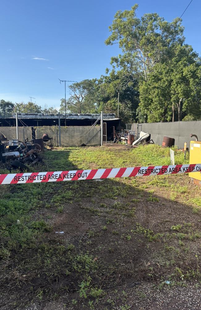 A property behind the Caltex service station in Howard Springs caught on fire. Picture: Thomas McLean