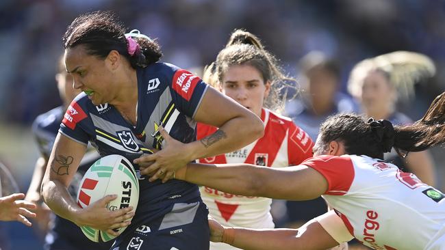 Shellie Long of the Cowboys is tackled during the round seven NRLW match between North Queensland Cowboys and St George Illawarra Dragons at Queensland Country Bank Stadium, on September 02, 2023, in Townsville, Australia. (Photo by Ian Hitchcock/Getty Images)