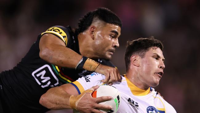 Mitchell Moses of the Eels is tackled. Photo: Jason McCawley/Getty Images