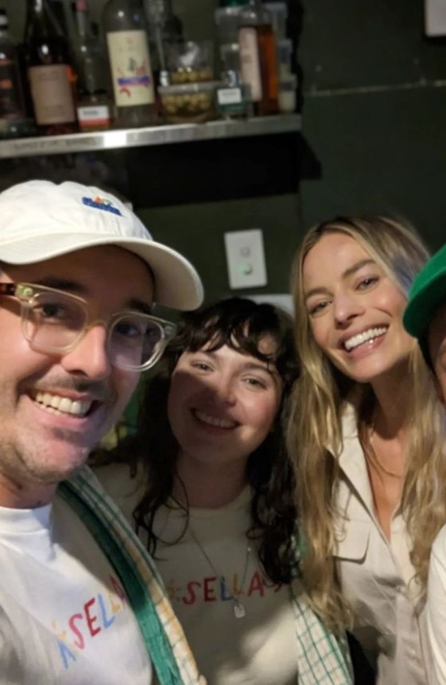 Margot Robbie poses for a picture with Rosella's bar staff. Picture: Instagram