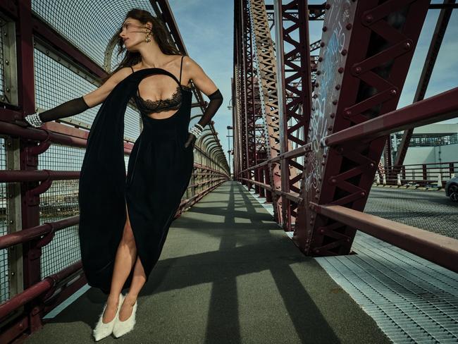 Phoebe Tonkin wears Ashi Studio haute couture dress and gloves; Paspaley studs, earrings, necklaces worn as bracelets, and ring; Magda Butrym shoes. Picture: Emma Summerton
