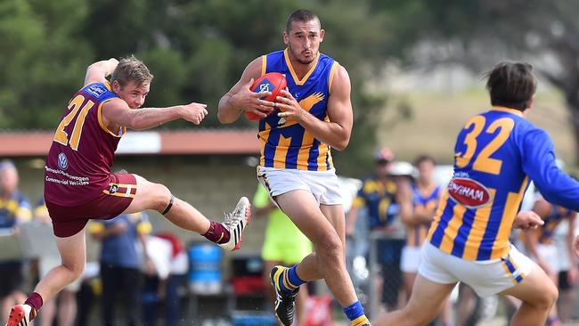 Former AFL and VFL player Scott Simpson on the burst for Somerville against Tyabb. Picture: Derrick den Hollander