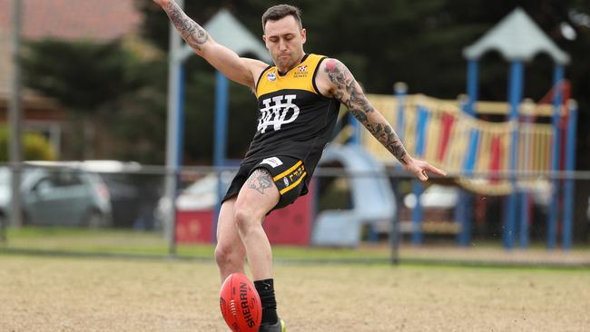 Werribee Districts skipper Daniel Schibeci gets a kick away. Picture: Local Legends Photography