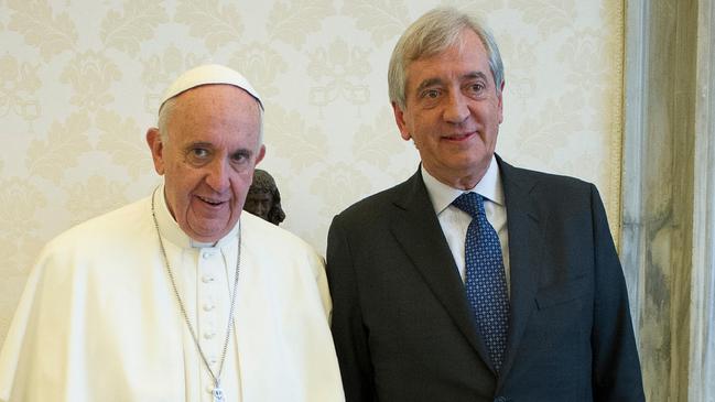 Pope Francis with the Vatican’s then auditor-general Libero Milone in 2016. Picture: Osservatore Romano / Reuters