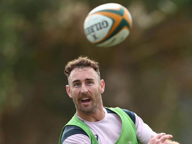 GOLD COAST, AUSTRALIA - JUNE 29: Nic White passes during the Australian Wallabies training session at Sanctuary Cove on June 29, 2023 in Gold Coast, Australia. (Photo by Chris Hyde/Getty Images)