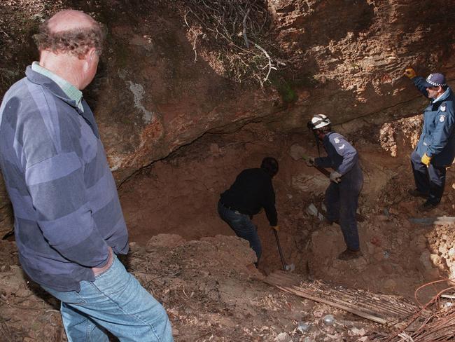 Search and Rescue Squad police dig open the old disused mine shaft at Talbot in their search for the remains of missing schoolboy Terry Floyd. (1997)