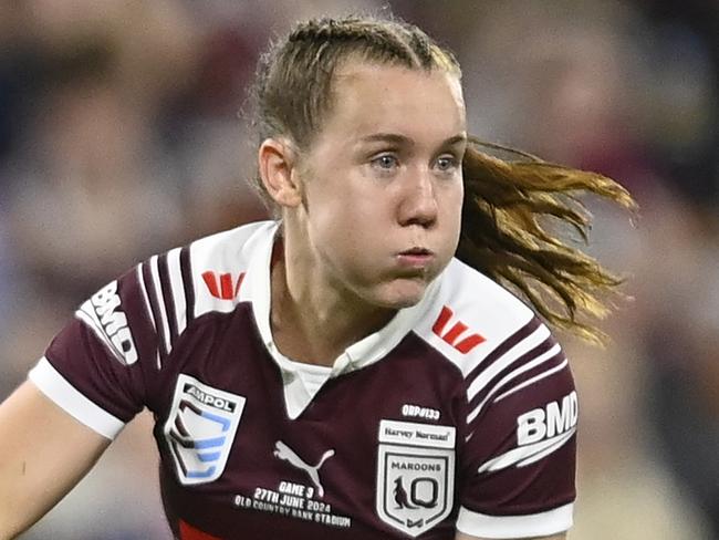 TOWNSVILLE, AUSTRALIA - JUNE 27:  Tamika Upton of the Maroons runs the ball during game three of the 2024 Women's State of Origin series between Queensland Maroons and New South Wales Sky Blues at Queensland Country Bank Stadium on June 27, 2024 in Townsville, Australia. (Photo by Ian Hitchcock/Getty Images)