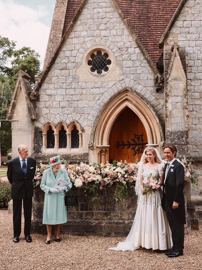 The newlyweds with Queen Elizabeth II and Prince Philip, Duke of Edinburgh. Picture: Benjamin Wheeler