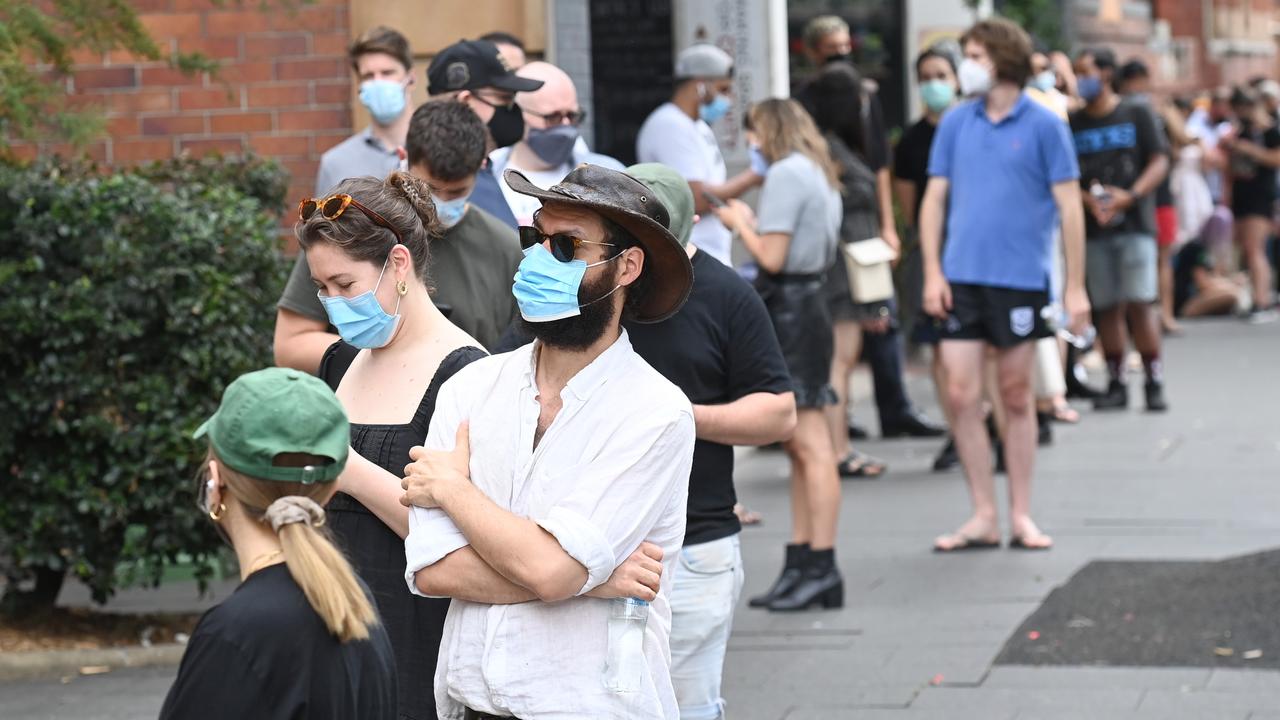 People line up at the Covid-19 Testing clinic in Redfern. Picture: Jeremy Piper