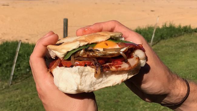 Tuck into a bacon and egg roll on Anzac Day. Picture: Jenifer Jagielski