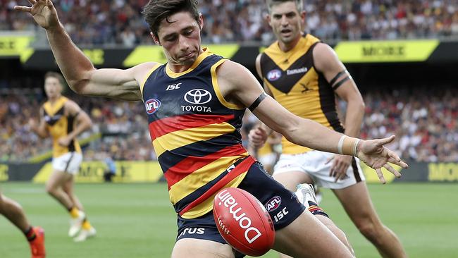 ON THE RUN: Chayce Jones drives the Crows forward during his AFL debut against Hawthorn in round one last year. Picture: Sarah Reed