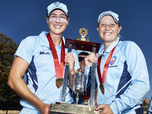 Perry with Alyssa Healy following her last match for the NSW Breakers, which just so happened to be a win in the Women’s National Cricket League final. Picture: Brett Hemmings/Getty Images