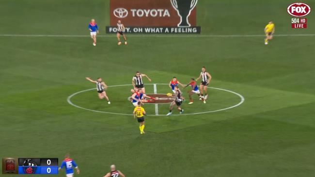 Somewhere between the Toyota and Coles signs there is a football game going on. Photo: Fox Footy.