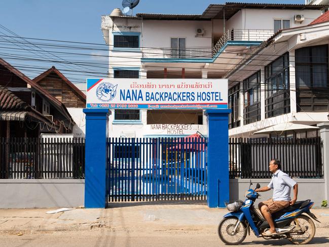 A motorcyclist passes the Nana Backpackers Hostel in Vang Vieng on November 24, 2024. Picture: AFP