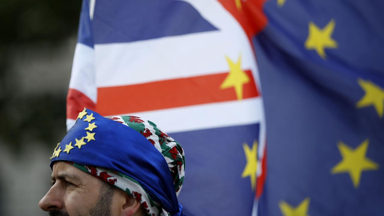 An activist wears a bandana of EU colours at a rally in London. Picture: Tolga AKMEN / AFP