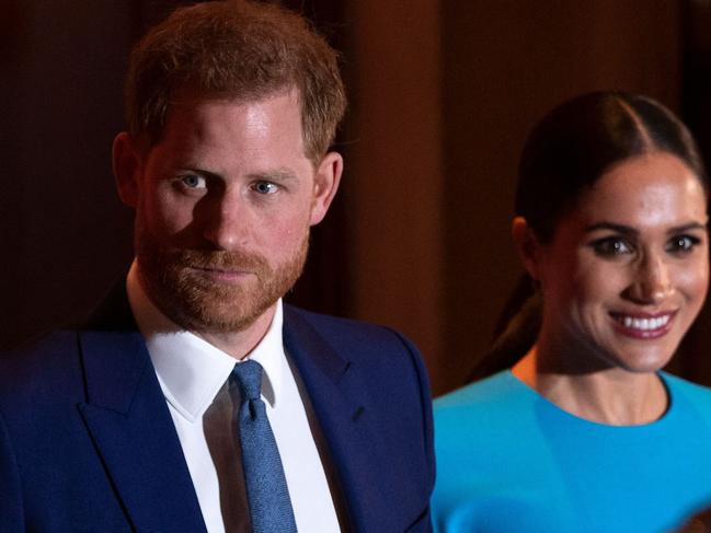 Prince Harry and Meghan Markle have been bumped down the royal website. Picture: AFP