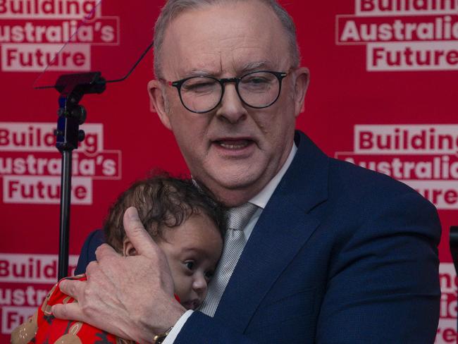 BRISBANE, AUSTRALIA - NewsWire Photos - DECEMBER 11, 2024:The Prime Minister Anthony Albanese holds baby Maise 3 months after delivering  a speech at the Morningside Panthers AFL club in Brisbane.Picture: NewsWire / Glenn Campbell