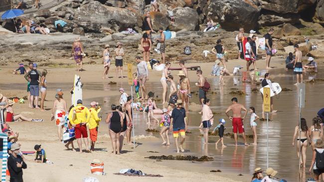 Freshwater Beach was very busy with beachgoers after it reopened on Sunday. Picture: Tim Pascoe