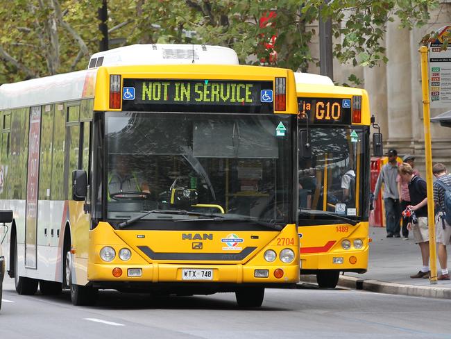 Public transport - Adelaide Metro bus during a ''dead running'' or Ghost run through King William Street, Adelaide. Buses running with a 'not in service' sign are usually travelling between routes.