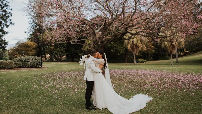 Emma and Sam Cooper during their wedding in Brisbane on September 6. Photo: Kiri Shay Photography