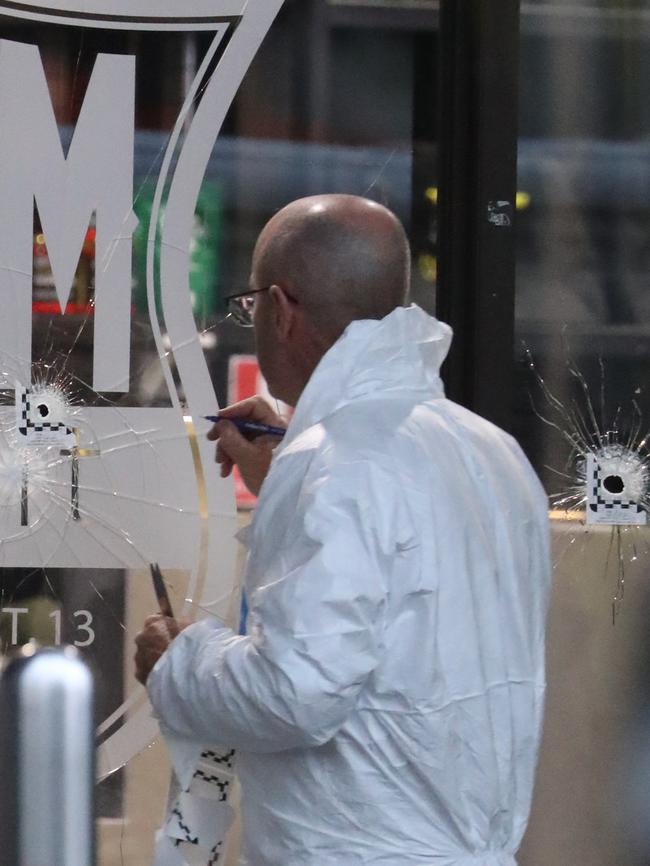 Police forensic teams at the scene of the shooting at the Bodyfit gym. Picture: John Grainger